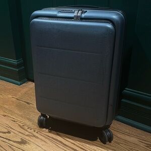 Blue carry on suitcase